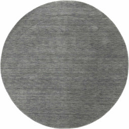 Vloerkleed MOMO Rugs Panorama Uni Rond Dark Grey Vloerkleed - 200 rond - Rond - Laagpolig,Rond Tapijt - Industrieel - Antraciet, Grijs