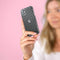 iMoshion Hoesje Geschikt voor Samsung Galaxy A21s Hoesje Siliconen - iMoshion Design hoesje - Transparant / Zwart / Hearts All Over Black