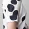 Witte blouse met zwarte stippen