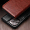Qialino - Geschikt voor iPhone 15 - Leren bookcase hoes - Cognac
