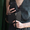 Selencia Hoesje Geschikt voor iPhone 12 Pro / 12 Hoesje Met Pasjeshouder - Selencia Llyr 2-in-1 Uitneembare Slang Bookcase - Zwart