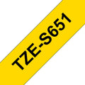 TZ-S651 24mm - black on yellow - extra sticky (8m)